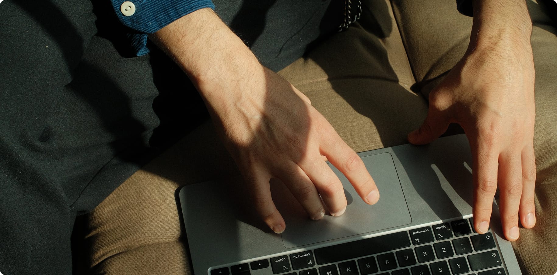 Security Hero - featuring a man on a laptop