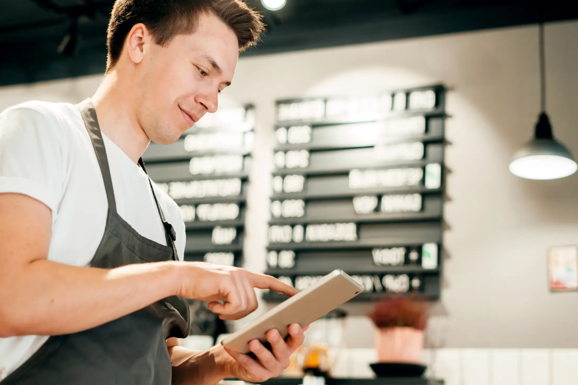 How does a kitchen order ticket travel from POS to kitchen