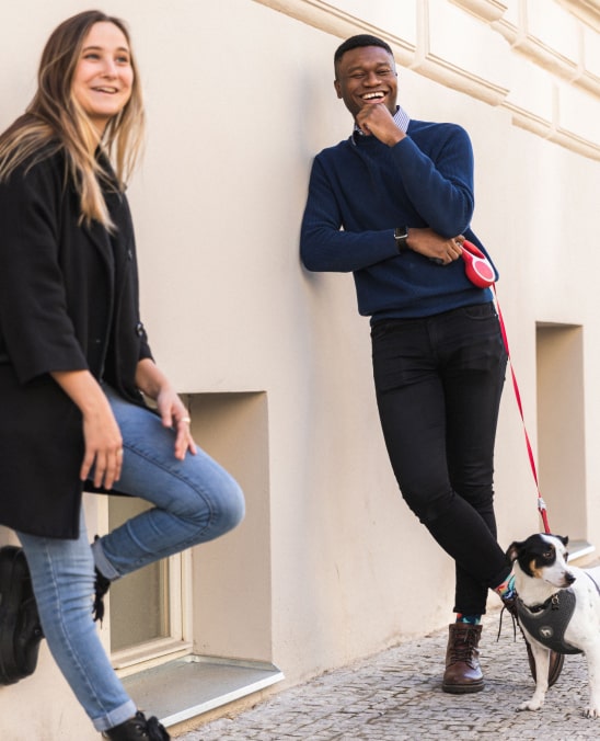 Two Mews employees outside the Prague office