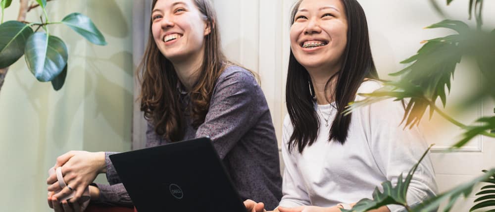Two Mews employees in the Prague office