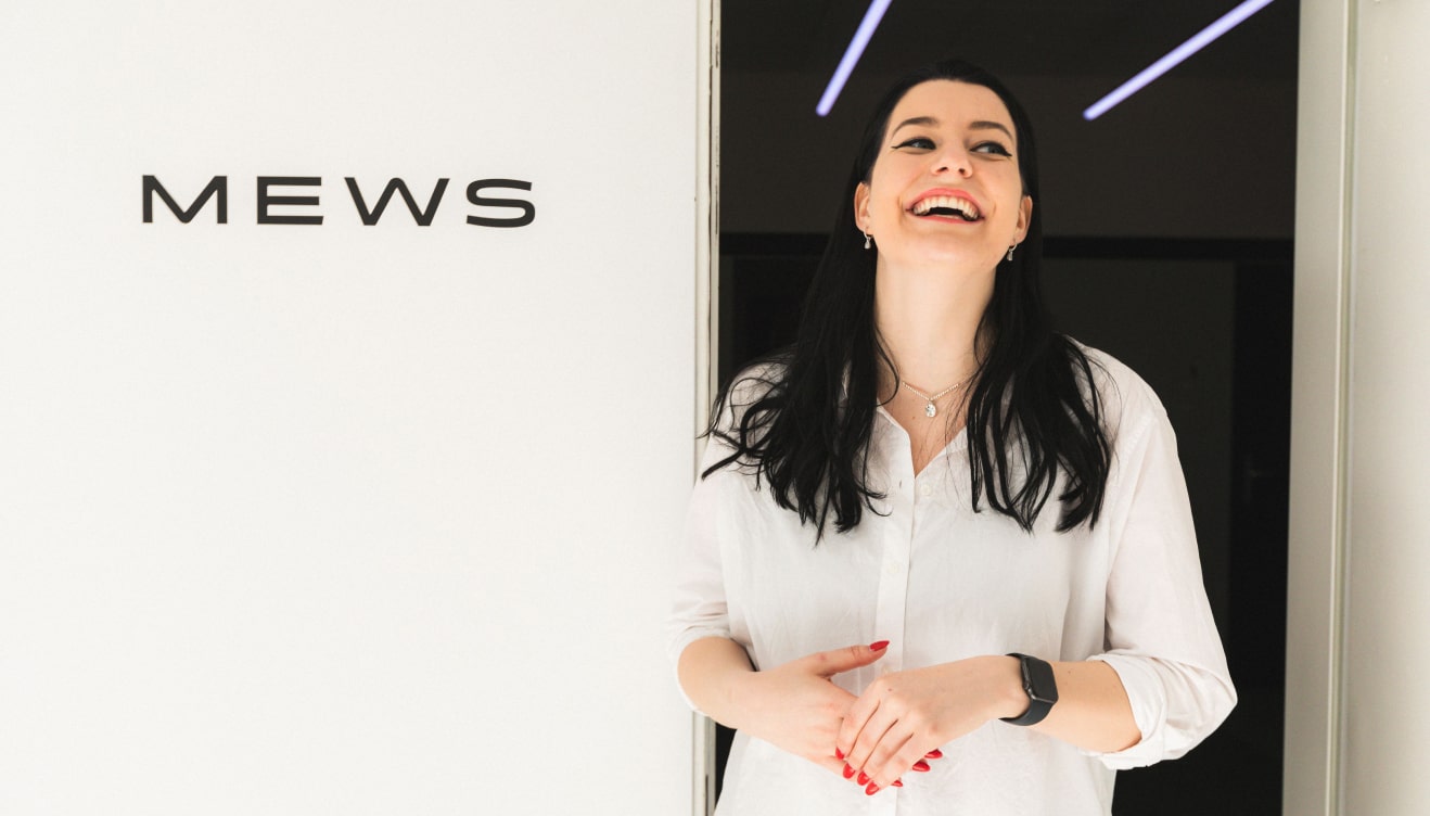 A Mews employee inside the Prague office