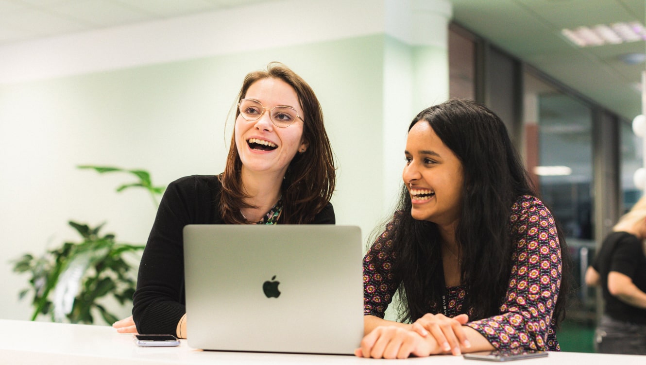 Mews employees inside the Prague office