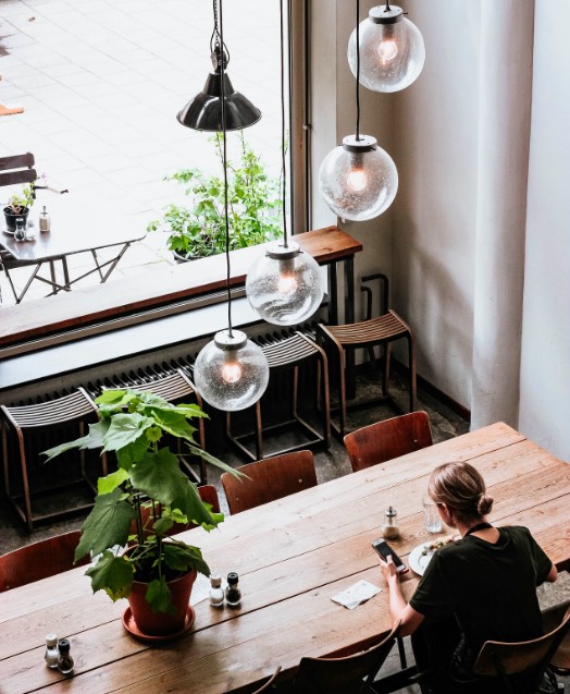 Lady sitting in a restaurant